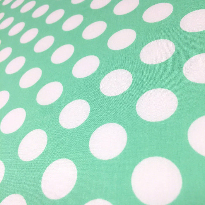Tissu de coton vert menthe à l'eau à gros pois blancs - TissusPapi.com