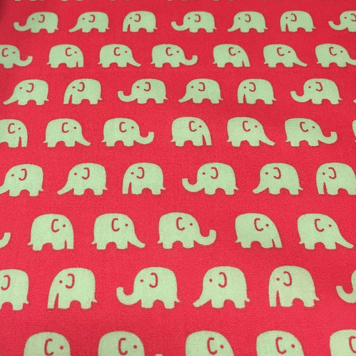 Tissu cotonnade rouge aux éléphants verts - TissusPapi.com