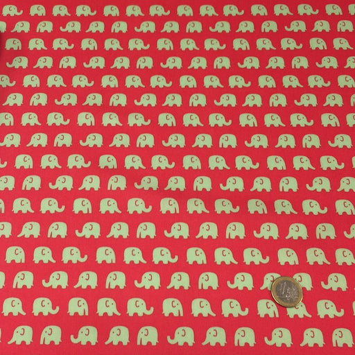 Tissu cotonnade rouge aux éléphants verts - TissusPapi.com