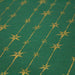 Tissu de coton de Noël aux étoiles & liserés dorés, fond vert - tissuspapi