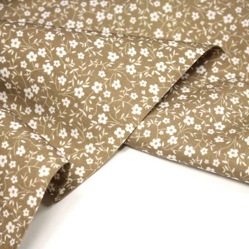 Tissu cotonnade ocre aux fleurs blanches - OEKO - TEX - TissusPapi.com