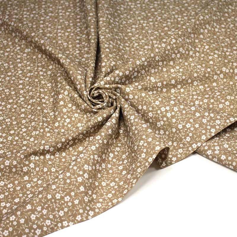 Tissu cotonnade ocre aux fleurs blanches - OEKO - TEX - TissusPapi.com