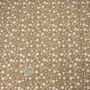 Tissu cotonnade ocre aux fleurs blanches - OEKO - TEX - TissusPapi.com