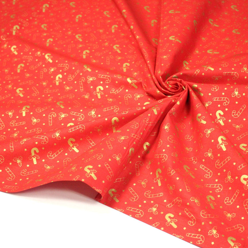 Tissu coton NOËL rouge aux houx et sucres d'orge dorés - OEKO - TEX - TissusPapi.com