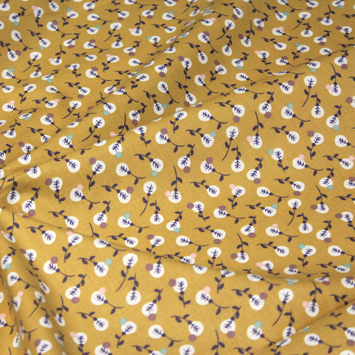 Tissu de coton moutarde aux fleurs graphiques - OEKO-TEX