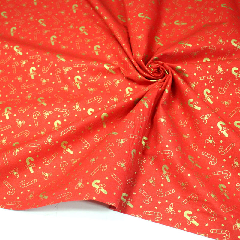 Tissu coton NOËL rouge aux houx et sucres d'orge dorés - OEKO - TEX - TissusPapi.com