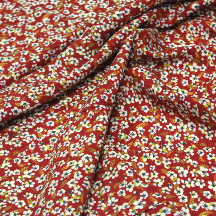 Tissu viscose fluide rouge aux fines fleurs de cerisier japonais blanches - COLLECTION SAKURA - OEKO-TEX