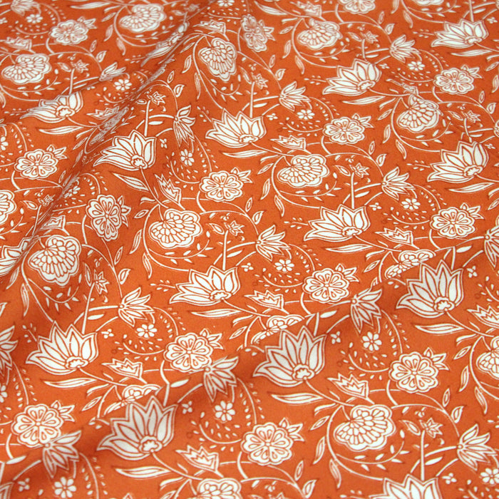 Tissu cotonnade motif fleuri indien rouge et blanc, fond orange - COLLECTION KALAMKARI