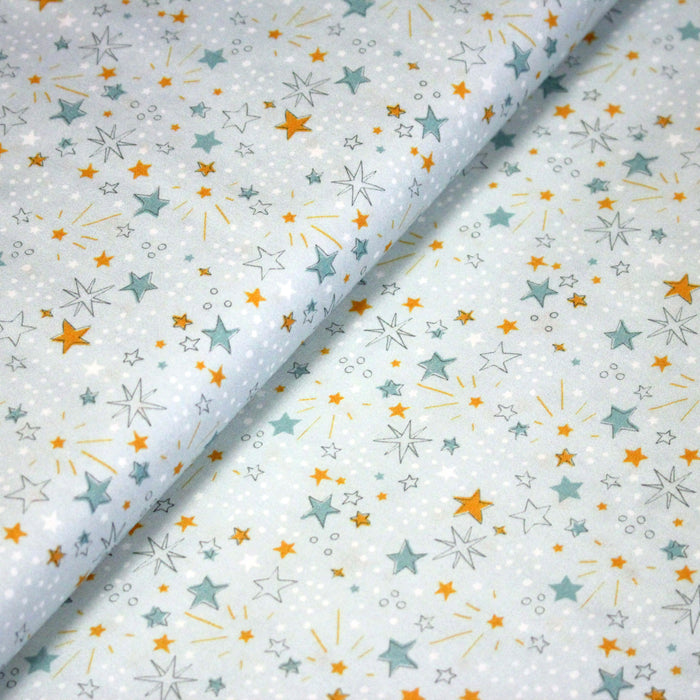 Tissu cotonnade bleu ciel aux fines étoiles jaunes et bleues - OEKO-TEX STANDARD 100