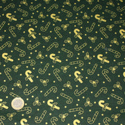 Tissu coton NOËL vert aux sucres d'orge et houx dorés - OEKO - TEX - TissusPapi.com