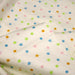 Tissu popeline coton écru aux pois et étoiles multicolores - TissusPapi.com