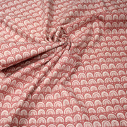 Tissu popeline coton rose indien aux arcs en ciel dessinés blancs - TissusPapi.com