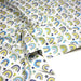 Tissu popeline coton blanc aux arcs en ciel verts bleus et jaunes - TissusPapi.com