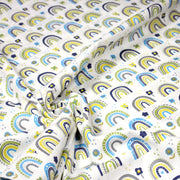 Tissu popeline coton blanc aux arcs en ciel verts bleus et jaunes - TissusPapi.com