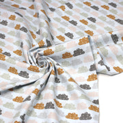 Tissu popeline coton rose bleu ciel aux nuages roses, gris et ocres - TissusPapi.com