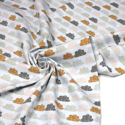 Tissu popeline coton rose bleu ciel aux nuages roses, gris et ocres - TissusPapi.com