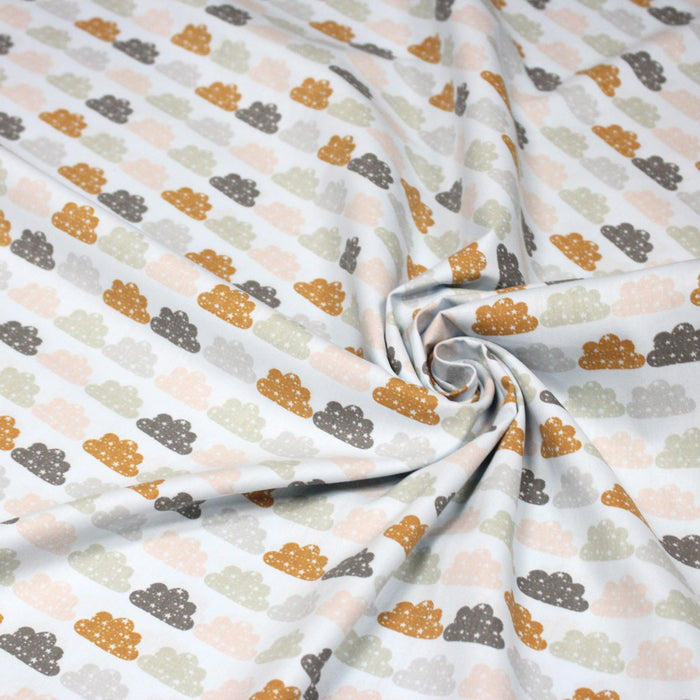 Tissu popeline coton rose bleu ciel aux nuages roses, gris et ocres - TissusPapi.com