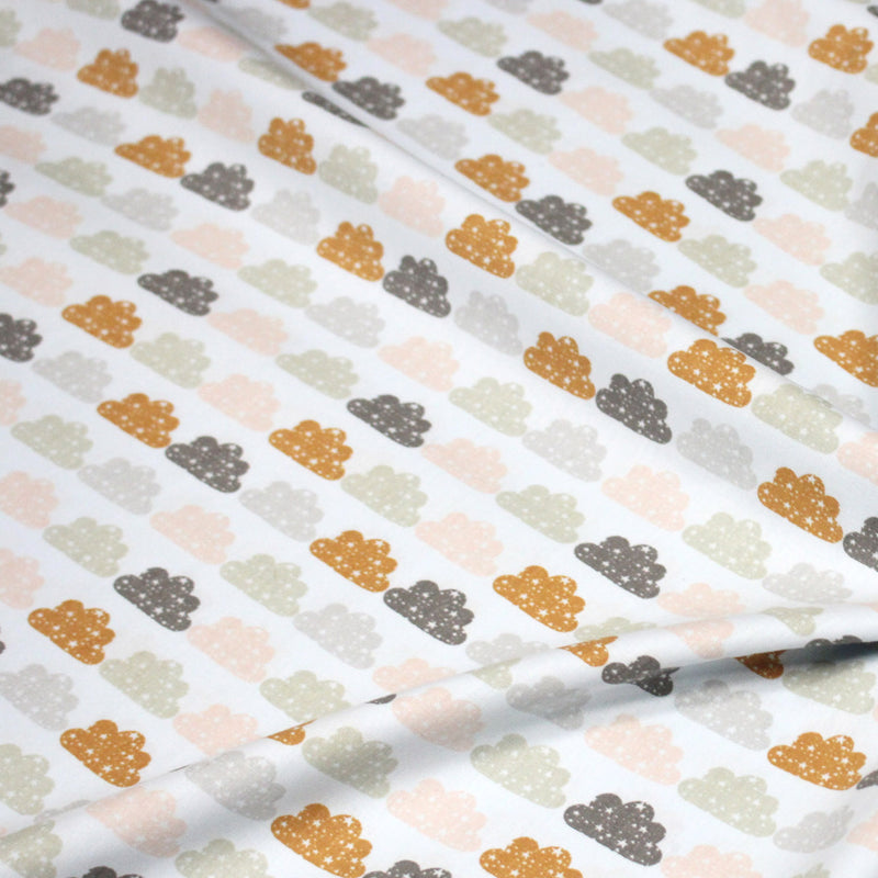 Tissu popeline coton rose bleu ciel aux nuages roses, gris et ocres - TissusPapi.com