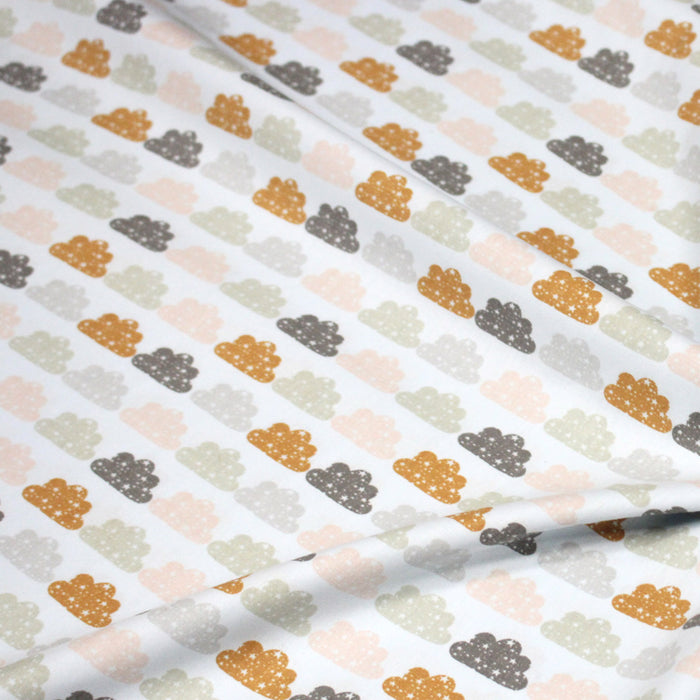 Tissu popeline coton rose bleu ciel aux nuages roses, gris et ocres - TissusPapi.com