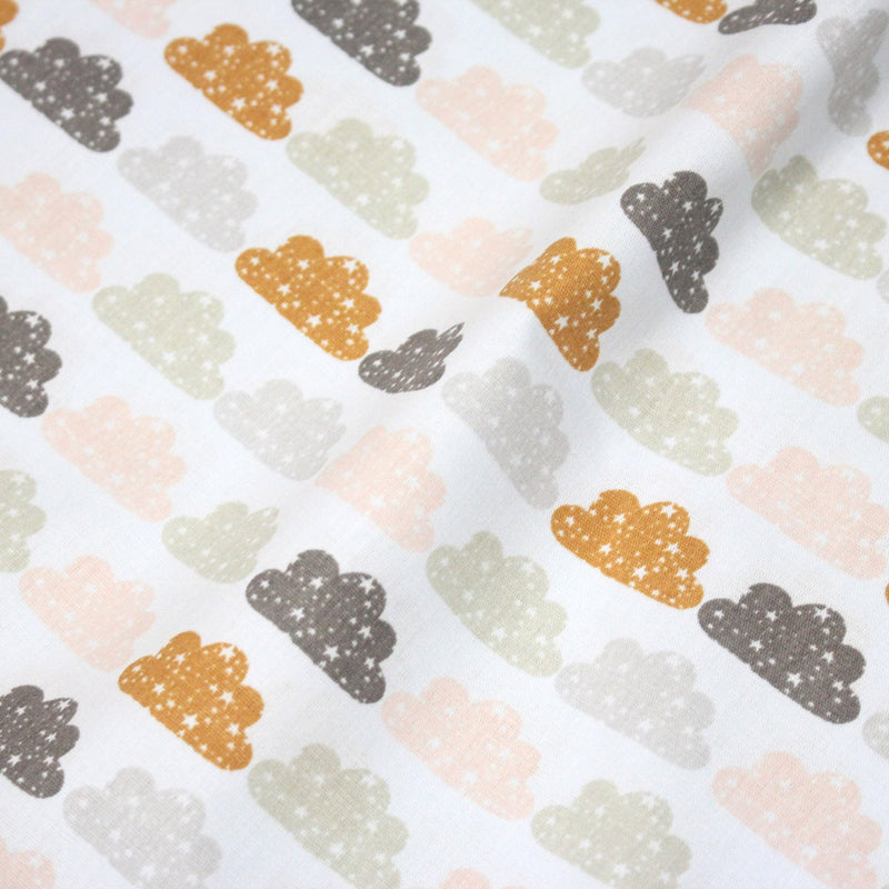 Tissu popeline coton rose bleu ciel aux nuages roses, gris et ocres - TissusPapi.com