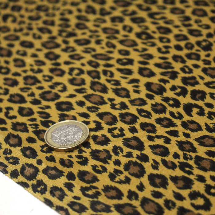 Tissu coton LEOPARD, taches noires et fauve, fond jaune moutarde - OEKO-TEX