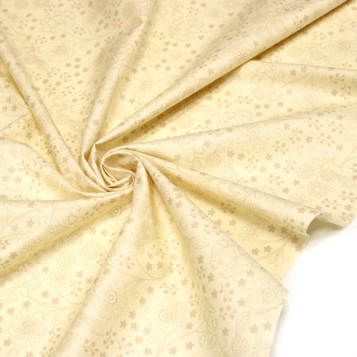 Tissu popeline de coton jaune beurre aux fines fleurs beiges - TissusPapi.com
