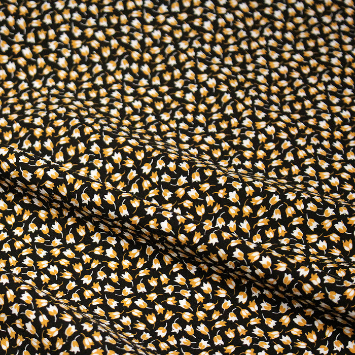 Tissu popeline de viscose noire aux fines fleurs ocres et blanches - Fabrication française - OEKO-TEX