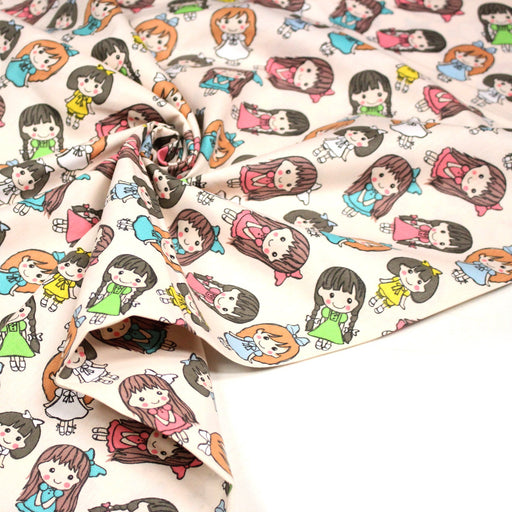 Tissu popeline coton aux petits filles façon bande dessinée - TissusPapi.com