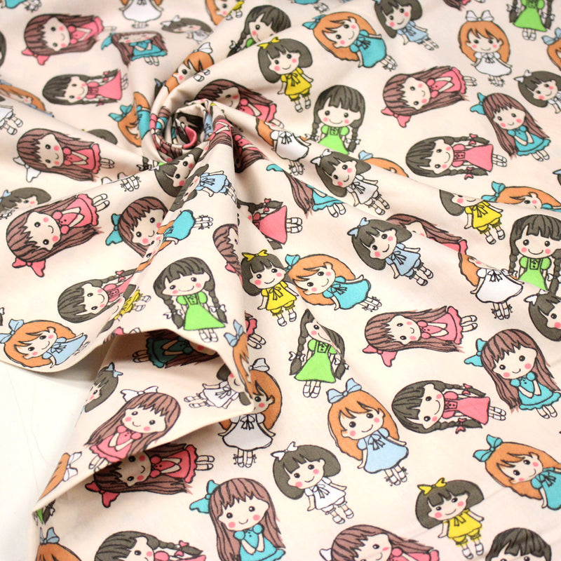 Tissu popeline coton aux petits filles façon bande dessinée - TissusPapi.com