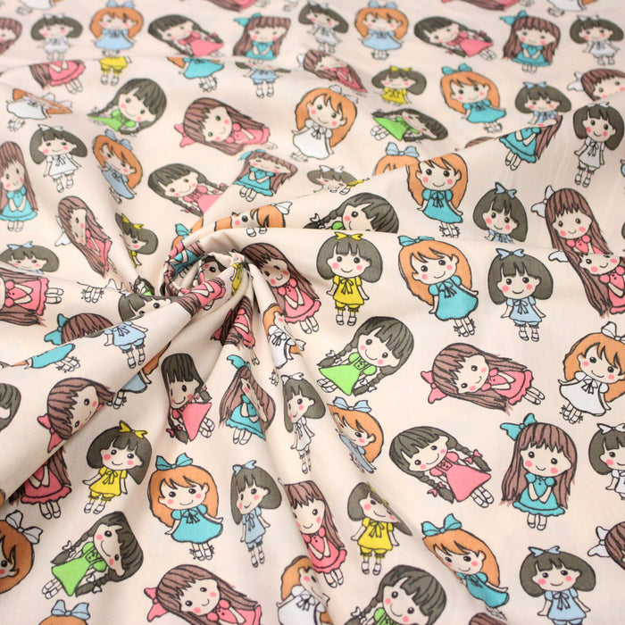 Tissu popeline coton aux petits filles façon bande dessinée - TissusPapi.com