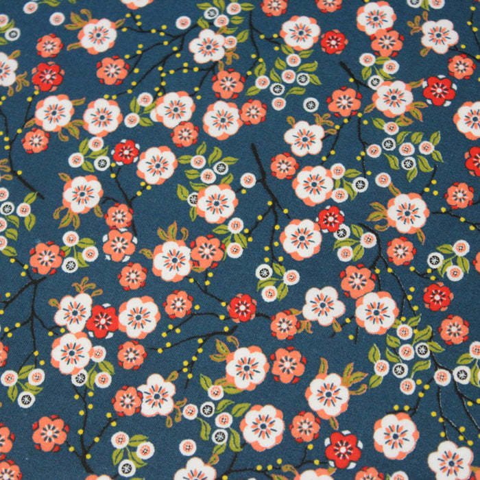 Tissu de coton aux fleurs de cerisier japonais Sakura blanches, jaunes et roses, fond bleu pétrole - OEKO-TEX