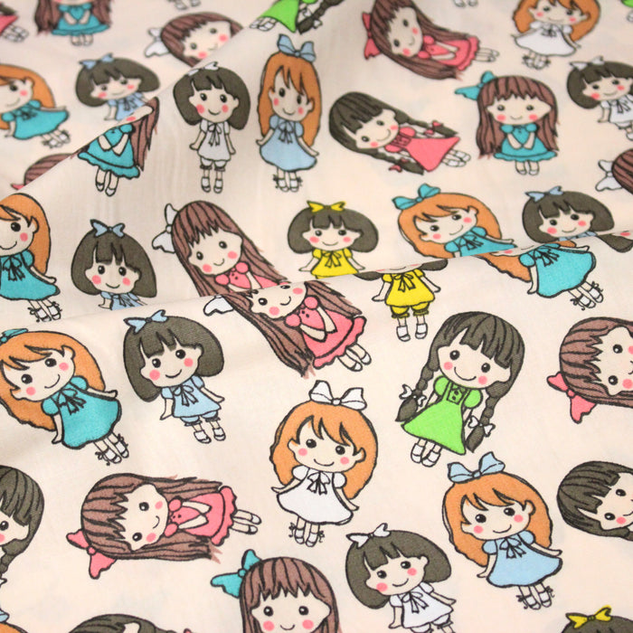Tissu popeline coton aux petits filles façon bande dessinée - TissusPapi.com