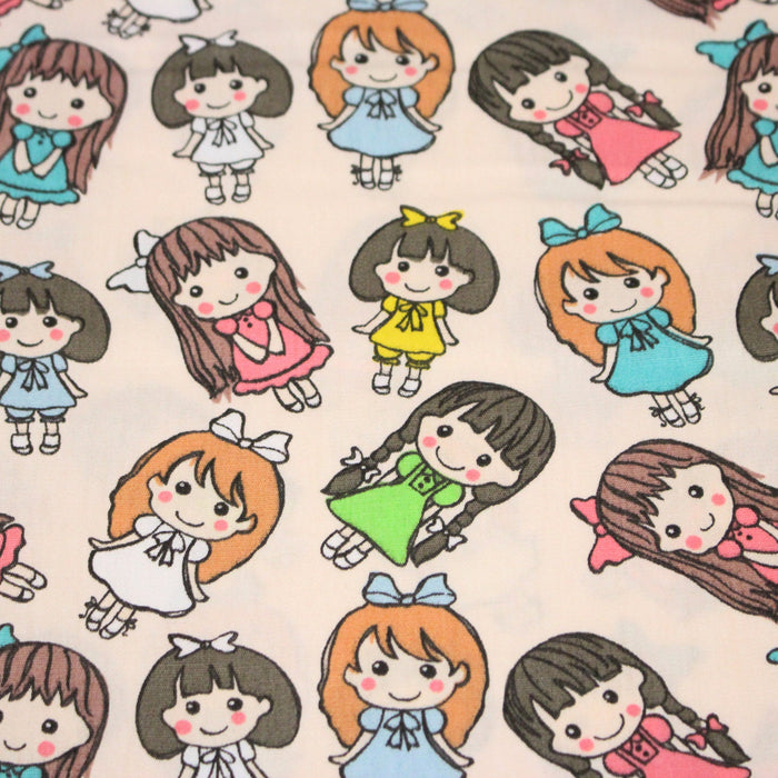Tissu popeline coton aux petits filles façon bande dessinée - TissusPapi.com