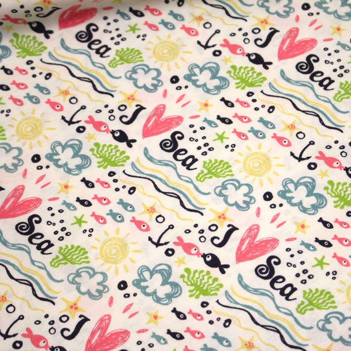 Tissu popeline coton I LOVE THE SEA, écru aux motifs marins multicolores - TissusPapi.com