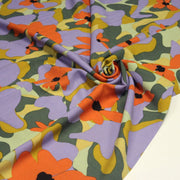Tissu Viscose fluide AIMEE aux fleurs graphiques vertes, oranges et mauves - OEKO - TEX STANDARD 100 - TissusPapi.com