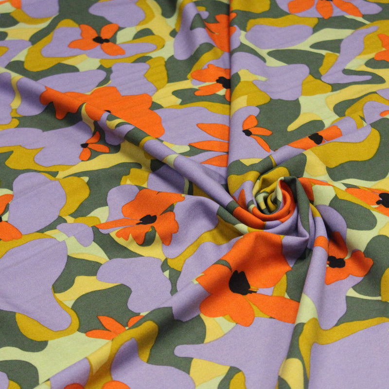 Tissu Viscose fluide AIMEE aux fleurs graphiques vertes, oranges et mauves - OEKO - TEX STANDARD 100 - TissusPapi.com