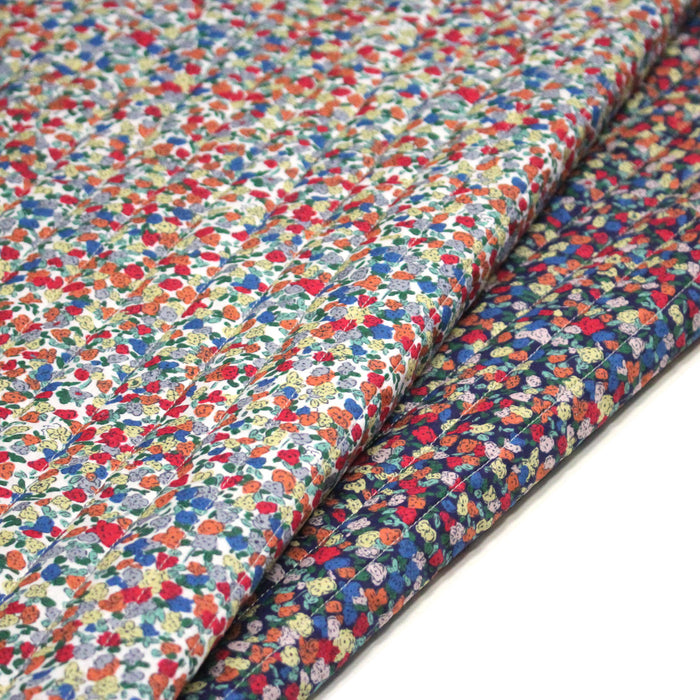 Tissu matelassé FLEURI fines fleurs : fond bleu ou fond blanc - OEKO-TEX
