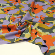 Tissu Viscose fluide AIMEE aux fleurs graphiques vertes, oranges et mauves - OEKO - TEX STANDARD 100 - TissusPapi.com