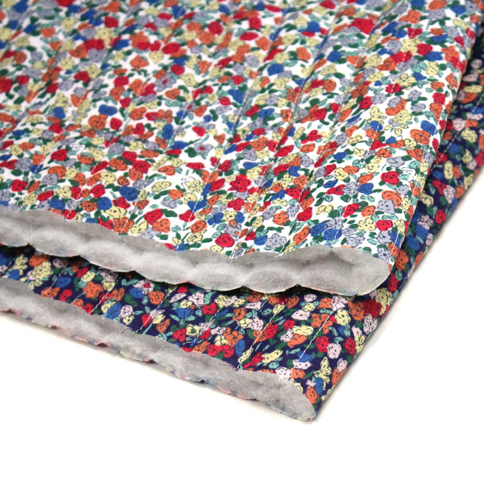 Tissu matelassé FLEURI fines fleurs : fond bleu ou fond blanc - OEKO-TEX