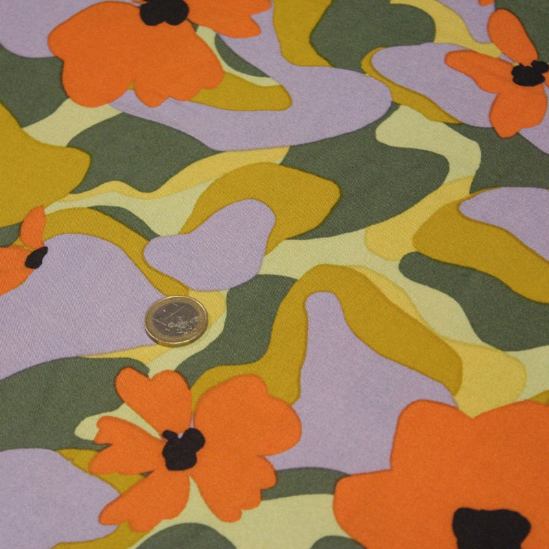 Tissu Viscose fluide AIMEE aux fleurs graphiques vertes, oranges et mauves - OEKO - TEX STANDARD 100 - TissusPapi.com
