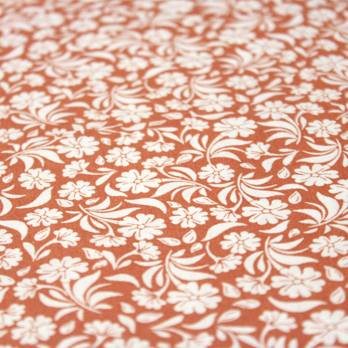 Tissu de coton fleuri, orange aux fleurs blanches - OEKO-TEX