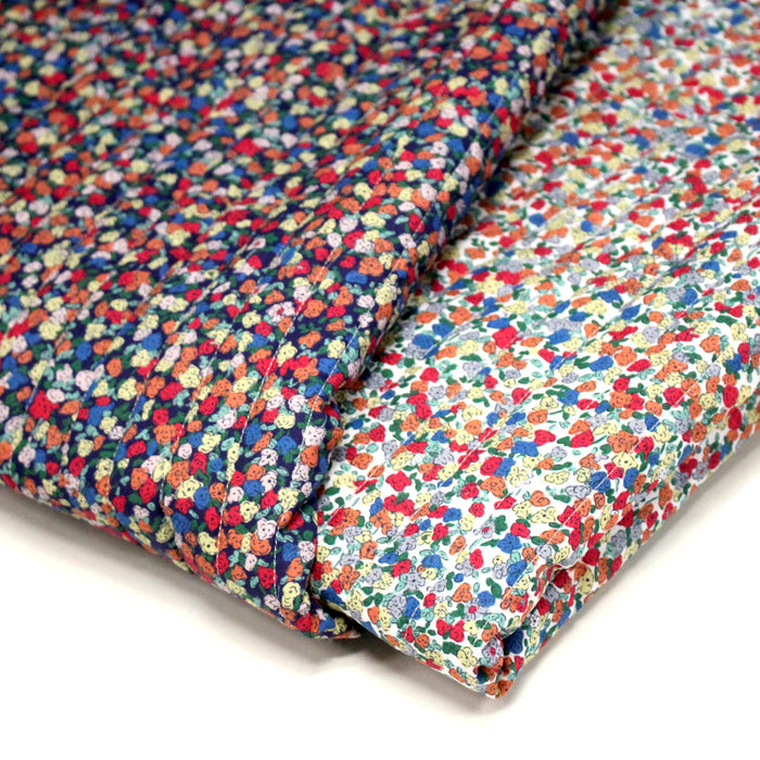 Tissu matelassé FLEURI fines fleurs : fond bleu ou fond blanc - OEKO-TEX