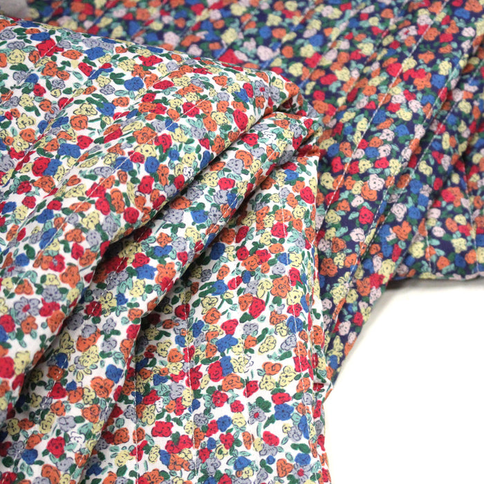 Tissu matelassé FLEURI fines fleurs : fond bleu ou fond blanc - OEKO-TEX