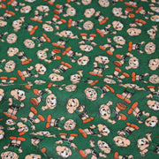 Tissu popeline coton vert au petit bonhomme, façon BD - TissusPapi.com