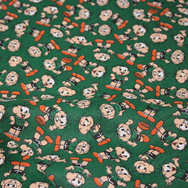 Tissu popeline coton vert au petit bonhomme, façon BD - TissusPapi.com