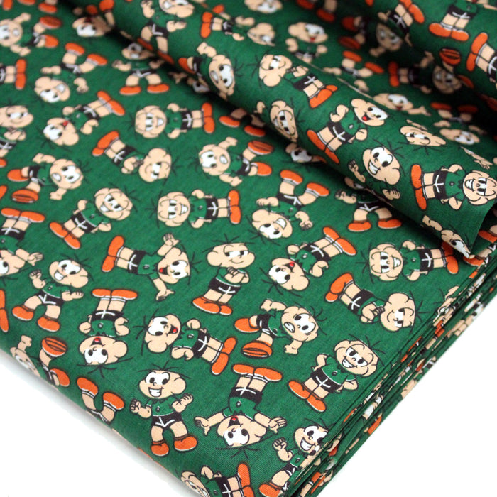 Tissu popeline coton vert au petit bonhomme, façon BD - TissusPapi.com
