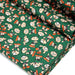 Tissu popeline coton vert au petit bonhomme, façon BD - TissusPapi.com