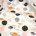 Tissu popeline coton LES PLANETES bleues, roses, oranges, fond écru - TissusPapi.com