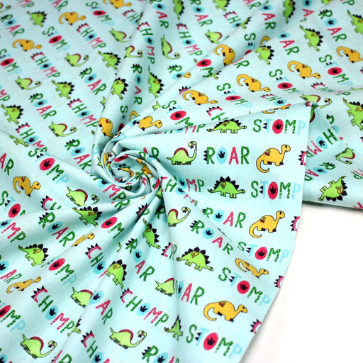 Tissu popeline coton DINO ROAR, bleu aux motifs dinosaures multicolores - TissusPapi.com