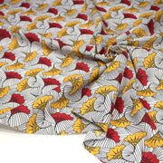 Tissu cotonnade motif WAX floral, fleurs rouges et jaunes - OEKO - TEX STANDARD 100 - TissusPapi.com